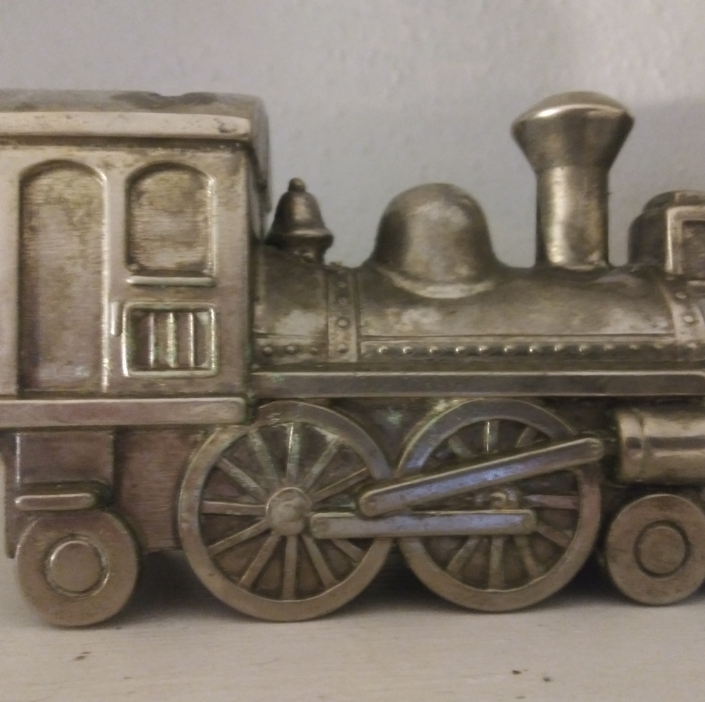 Silver plated train coin bank
